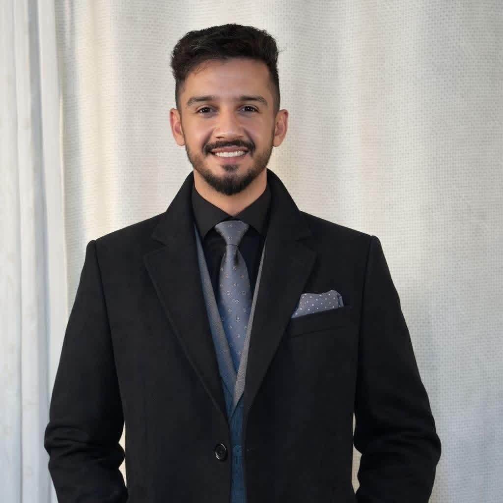 Latif Rahimi, founder and CEO of BizTomate Inc, in a black suit.