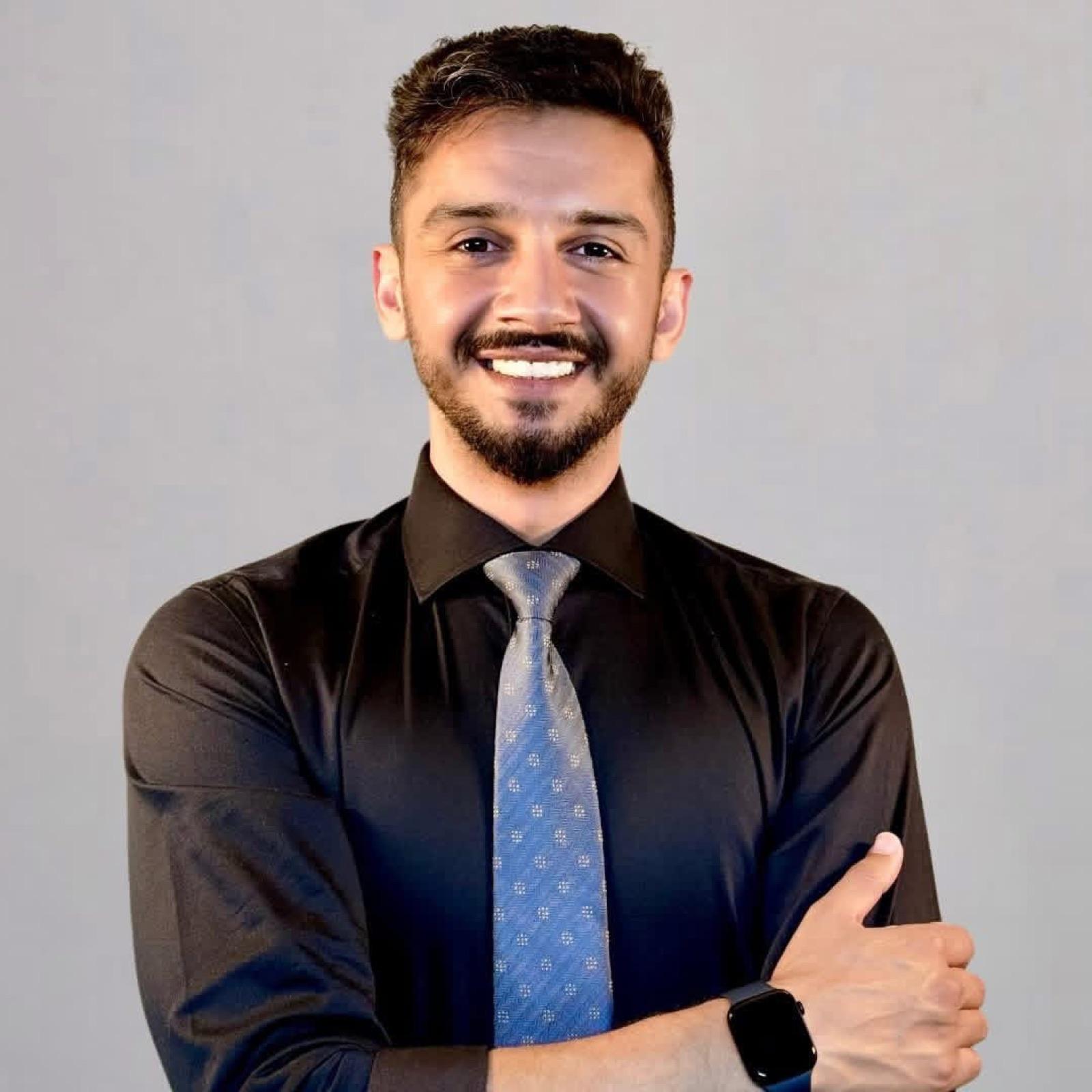 Latif Rahimi, founder and CEO of BizTomate Inc, professional portrait.